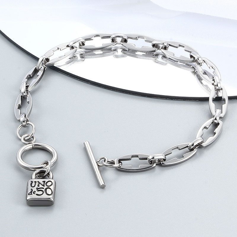 PULSERA CROSS ONE